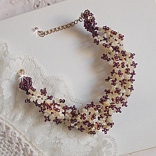 Bracelet Les Floralies mont&eacute; avec des rocailles Am&eacute;thyste et Ivoire